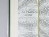 an open book with a picture of a cat on it