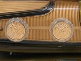 a close up of an old fashioned radio on a table