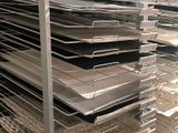 a lot of trays that are on the shelves