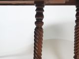 an image of a wooden table with two legs and a table top