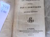 an old book with a piece of paper sticking out of it