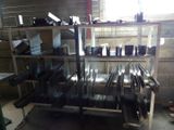 a rack with many different types of metal items on it