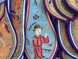many pieces of cloth with a picture of a man on them