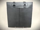 black leather briefcase with metal handles on a white background