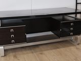 a desk with two drawers and a shelf on the wall