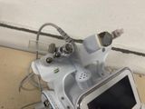 a cell phone that is sitting on top of a machine