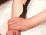 a painting of a woman holding a cat in her lap