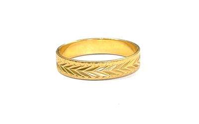 une image d'une bague en or sur fond blanc