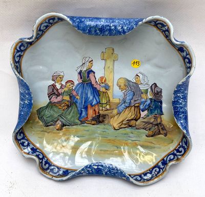 an image of a blue and white plate with a picture of a group of people