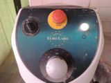 a close up of an electric blender with buttons on it