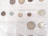 a picture of a collection of coins in a clear box