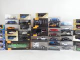 a lot of toy cars and trucks in the boxes