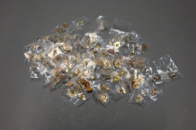 a pile of nuts and nuts in a bag