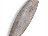 a wooden object that is on a white surface