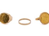 an image of a gold coin and a ring on a white background