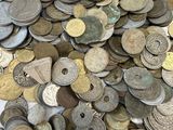 a pile of coins sitting on top of a table