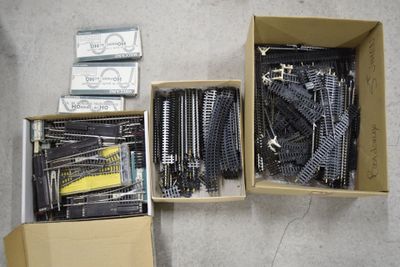 a box of train tracks and a box of other train tracks