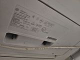 a close up view of a white dishwasher in a kitchen