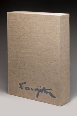 an image of a brown book with a blue writing on it
