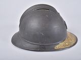a helmet that is sitting on a white surface