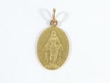 une image représentant une pièce d'or sur laquelle figure la Vierge Marie