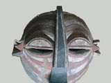 an image of a mask made of clay