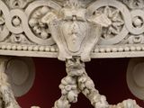 a marble table with carvings on the top of it