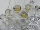 a lot of glass items that are on a table