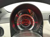 a close up of a car dashboard with a speedometer