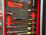 a red box with a bunch of tools inside of it