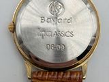 an image of a close up of a watch on a white surface