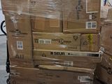 many boxes stacked on top of each other on a pallet