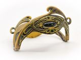 an image of a close up of a bracelet with a black stone on it