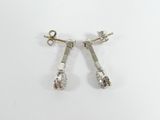 pair of diamond stud earrings on a white background