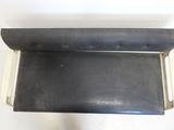 an image of a piece of black leather on a white surface