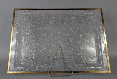 a close up of a glass tray on a metal stand