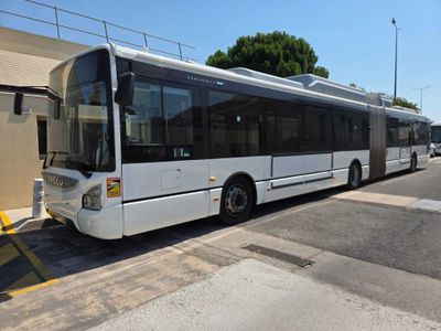 a bus that is parked on the side of the road