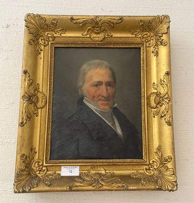 portrait of a man in a blue jacket and white shirt