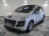 a picture of a white car parked in a garage