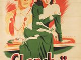 une vieille affiche de cinéma représentant un homme et une femme assis sur un banc