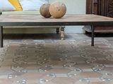 a coffee table with two coconuts on it in a living room