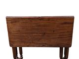a small table with a wooden top on a white background