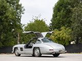 an image of a silver sports car parked in a parking lot