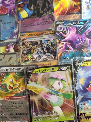 many different types of pokemon cards on the table