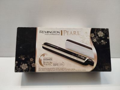 packaging of remington pearl hair straightener in a box on a table