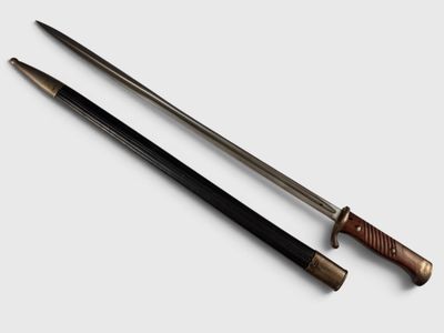 an image of a pair of two swords on a white surface