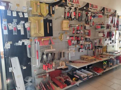 many different tools on the wall in this store