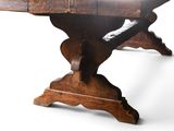 a wooden table with a wooden top and a wooden base