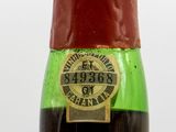 a bottle of liquor that is sitting on a table