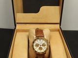 an image of a watch in a box on a table